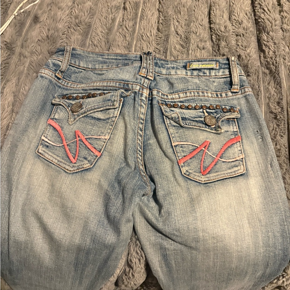 Stylish Blue Jeans with Pink Accents